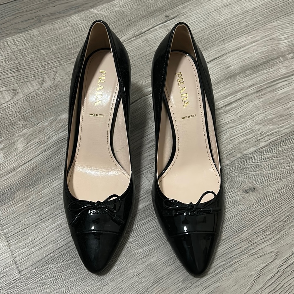Never worn black Prada heels with bow.